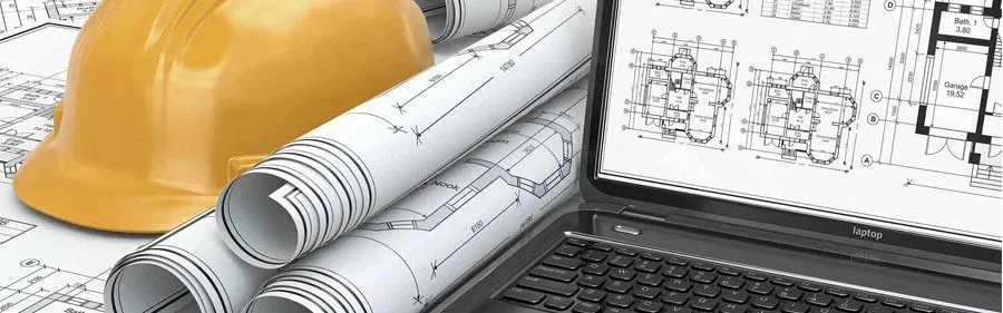 Рабочий производит сварку металлоконструкций на заводе металлоконструкций